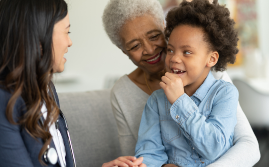 a person and a child smiling