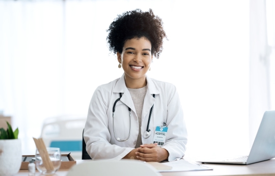 a person in a white coat